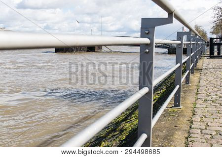 Seaside Landscape In Spring Day. Ship In Harbor On The Sea Coast.