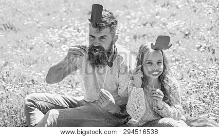 Aristocrates Concept. Dad And Daughter Sits On Grass At Grassplot, Green Background. Family Spend Le