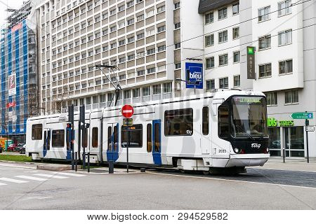 Grenoble, France - March 14, 2019: Articulated Urban Tramway Alstom Tfs2 In The City Street.