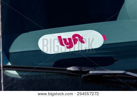 Indianapolis - Circa April 2019: Car For Hire With A Lyft Sticker. Lyft And Uber Have Replaced Many 