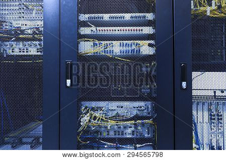 Technical Wall Of Cellular Data Terminal In Modern Communication Center. Close Up Backhaul Network E