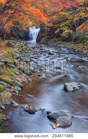 Waterfall With Vibrant Trees In Autumn, Tometaki Waterfall - Kazuno, Akita, Japan