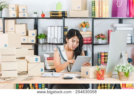 Portrait Of Young And Beautiful Asian Business Lady In Casual Fashion Dress Preparing Various Packag