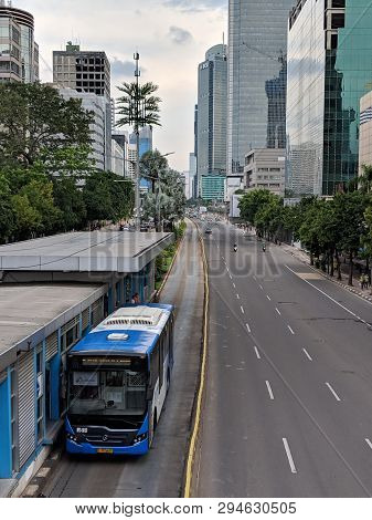 Jakarta, Indonesia - February 16, 2019: Transjakarta Bus Passing Through Jalan Thamrin (thamrin Stre