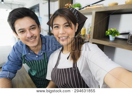 Shot Of Happy Young And Beautiful Asian Couple In Love Enjoy Sharing Coffee Break Together In Modern