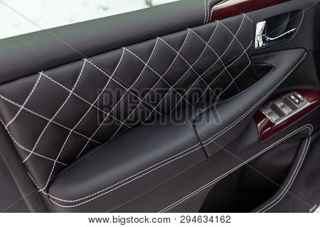 Interior Of A Luxury Car With Leather Interior Overtightened Stitching In The Form Of A Diamond Of W