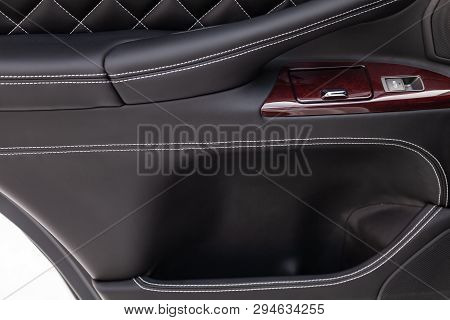 Interior Of A Luxury Car With Leather Interior Overtightened Stitching In The Form Of A Diamond Of W