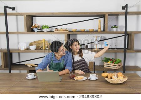 Shot Of Happy Young And Beautiful Asian Couple In Love Enjoy Sharing Coffee Break Together In Modern