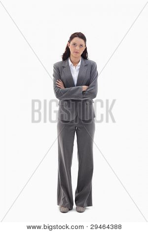 Businesswoman thinking against white background