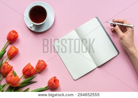 Notebook And Tulips On Pink Background. Place For Your Texy