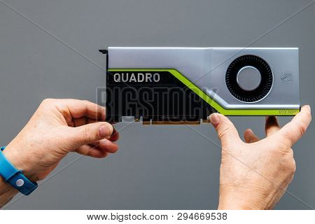 Paris, France - Mar 28 2019: Senior Man Showing Latest Nvidia Quadro Rtx 4000 Workstation Gpu Agains