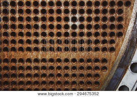 Rust Tube Sheet Of The Heat Exchanger For Maintenance, The Water Heater In The Boiler As Background