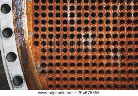 Rust Tube Sheet Of The Heat Exchanger For Maintenance, The Water Heater In The Boiler As Background