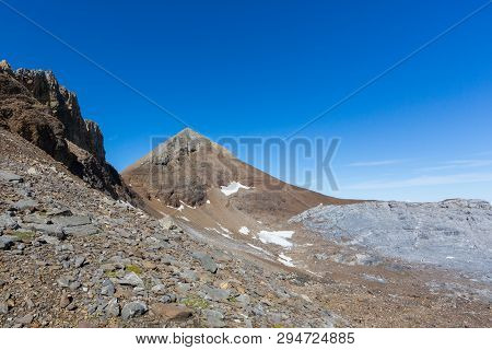 Natural Uri Rotstock Mountain Summit In Swiss Alps, Blue Sky