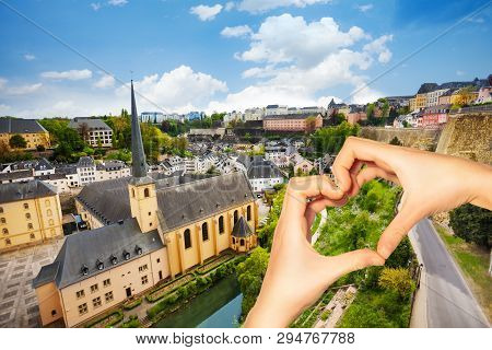 Hand Hold Red Heart Over Neumunster In Luxembourg