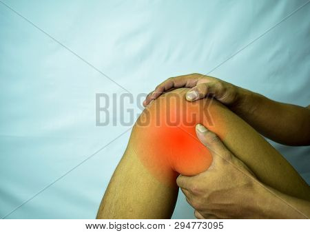 Suffering From Joint Pain With Red Spot. Hands On Leg As Hurt From Arthritis. Osteoarthritis Knee Di