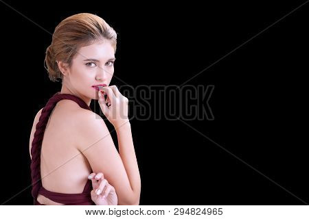 Attractive Young Woman Wear Red Evening Dress Fashion Posing And Truning Look Back At Camera On Isol