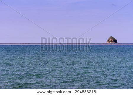 Cairns, Australia - February 18, 2019: Haycock Island Off Tropical Beach Of Palm Cove With Azure Cor