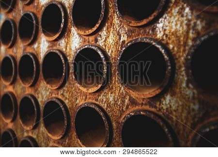 Rust Tube Sheet Of The Heat Exchanger For Maintenance, The Water Heater In The Boiler As Background 