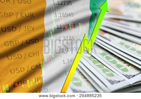 Ivory Coast Flag And Chart Growing Us Dollar Position With A Fan Of Dollar Bills