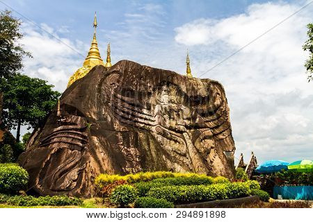 Golden Pagoda Sculpture,stone Carving At Wat Tham Pha Daen.sakon Nakhon,thailand( Generality In Thai