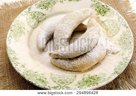 Classic Vanilla Kipferl, Traditional German Cookies With Powdered Sugar On A Plate