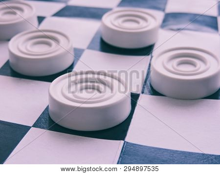 Checkerboard With Checkers. Business Strategy Competition, Strategic Planning For Winning Success. H