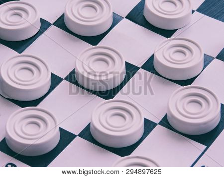 Checkerboard With Checkers. Business Strategy Competition, Strategic Planning For Winning Success. H