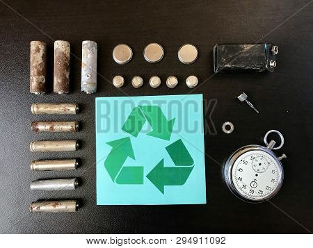 Corrosion-free Batteries.  Different Size And Shape.  A Broken Stopwatch. Recycling And Environmenta
