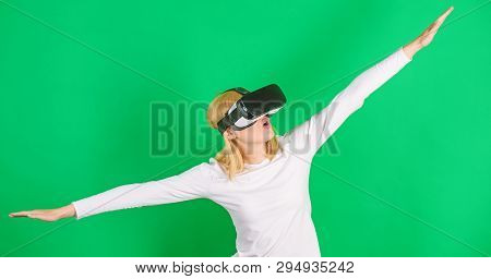 Woman Watching Virtual Reality Vision. Woman Using Virtual Reality Headset. Woman Wearing Virtual Re