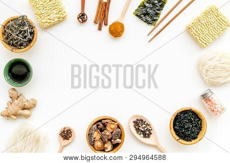 Rice Vermicelli, Noodles, Spices, Weeds Frame To Cook Chinese And Japanese Food On White Background 