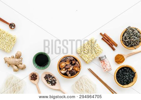 Chinese And Japanese Food Cooking With Ginger, Spices And Noodles On White Background Top View Mocku