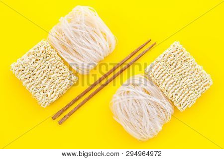 Geometric Design With Chinese, Japanese Products, Noodles, Rice Vermicelli, Sticks On Yellow Backgro