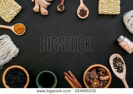 Geometric Design With Chinese, Japanese Products, Noodles, Weeds. Spices, Mushrooms On Black Backgro