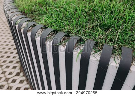 Matellic Fence Near The Lawn In The Park