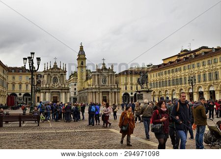 Turin, Piedmont, Italy. April 2019. In Piazza San Carlo People Gathered For An Event, In The Backgro