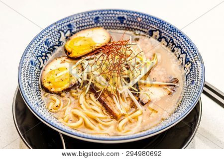 Umami Ramen With Soft-boiled Egg With Char Siew And Bean Sprouts