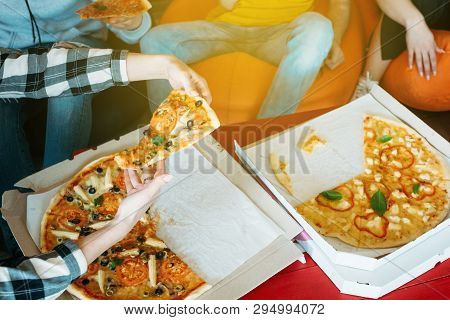 Pizza Time. Youth Eating Habit. Business Team Lunch. Group Of Colleagues Friends Relaxing With Unhea