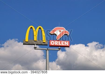 Advertising Pylons. The Trademark Of Mcdonald's And The Orlen Oil Company.  Sieganów. Poland. 20 May