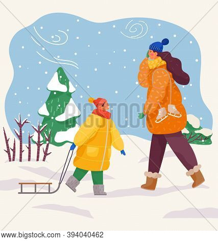 Couple Mom And Son Walking In Winter In Cold Weather. Happy Family Resting In Warm Clothes Outdoors 