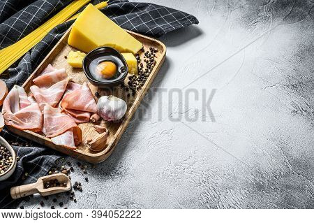 Traidtional Italian Pasta Carbonara Ingredients. Bacon, Spaghetti, Parmesan And Pecorino Cheese, Egg