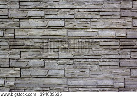 Gray Background Of Imitation Stone Masonry Tiles For Exterior Walls Of Buildings And Structures. Dec