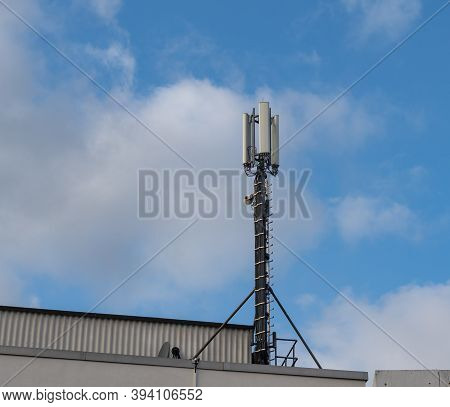 Radio Mast, Directional Radio And Mobile Phone Mast Antenna System G5 Network Technology On A Reside