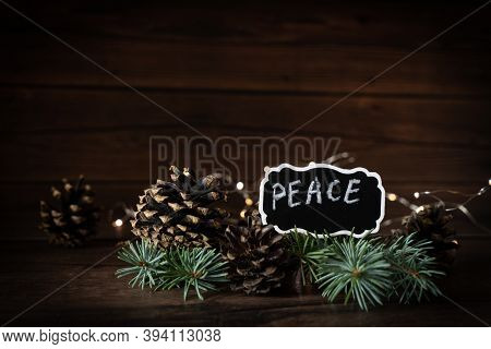 2021 Peace New Year's Eve Bokeh, Pine Cones Composition With Text Mock-up Evening Dark Flashlights,