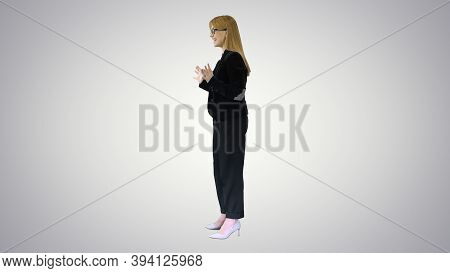Smiling Businesswoman Explaining Something Emotionaly On Gradien