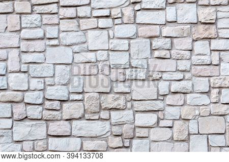 Old Stone Masonry Background. Stone Wall Texture And Pattern
