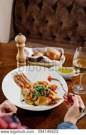 Fresh Salad Plate With Shrimp, Tomato And Mixed Greens On Wooden Background Close Up. Healthy Food.h