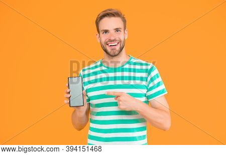 Mobile Services. Free Internet. Application Smartphone. Download And Start Play. Man Pointing At Sma