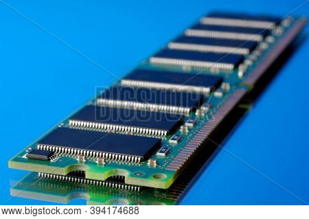 SDRAM DDR computer memory stick on blue background