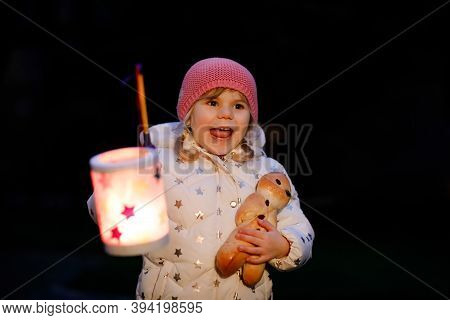 Little Kid Girl Holding Selfmade Lanterns With Candle For St. Martin Procession. Healthy Cute Toddle